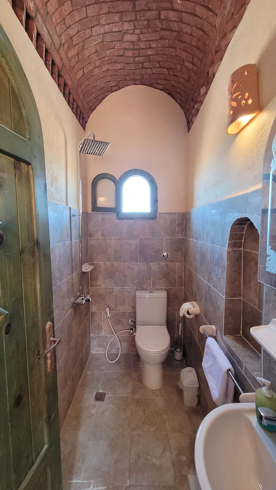 A bathroom beneath a vaulted ceiling · Standard