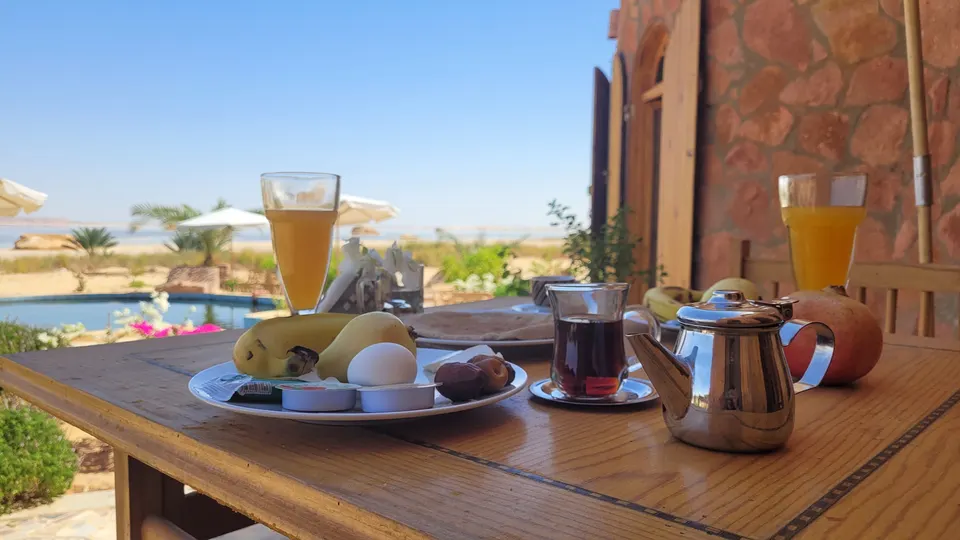 A table on the terrace overlooking the garden · Suite