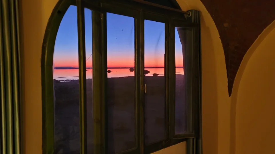 Evening colours through the arched windows · Panorama