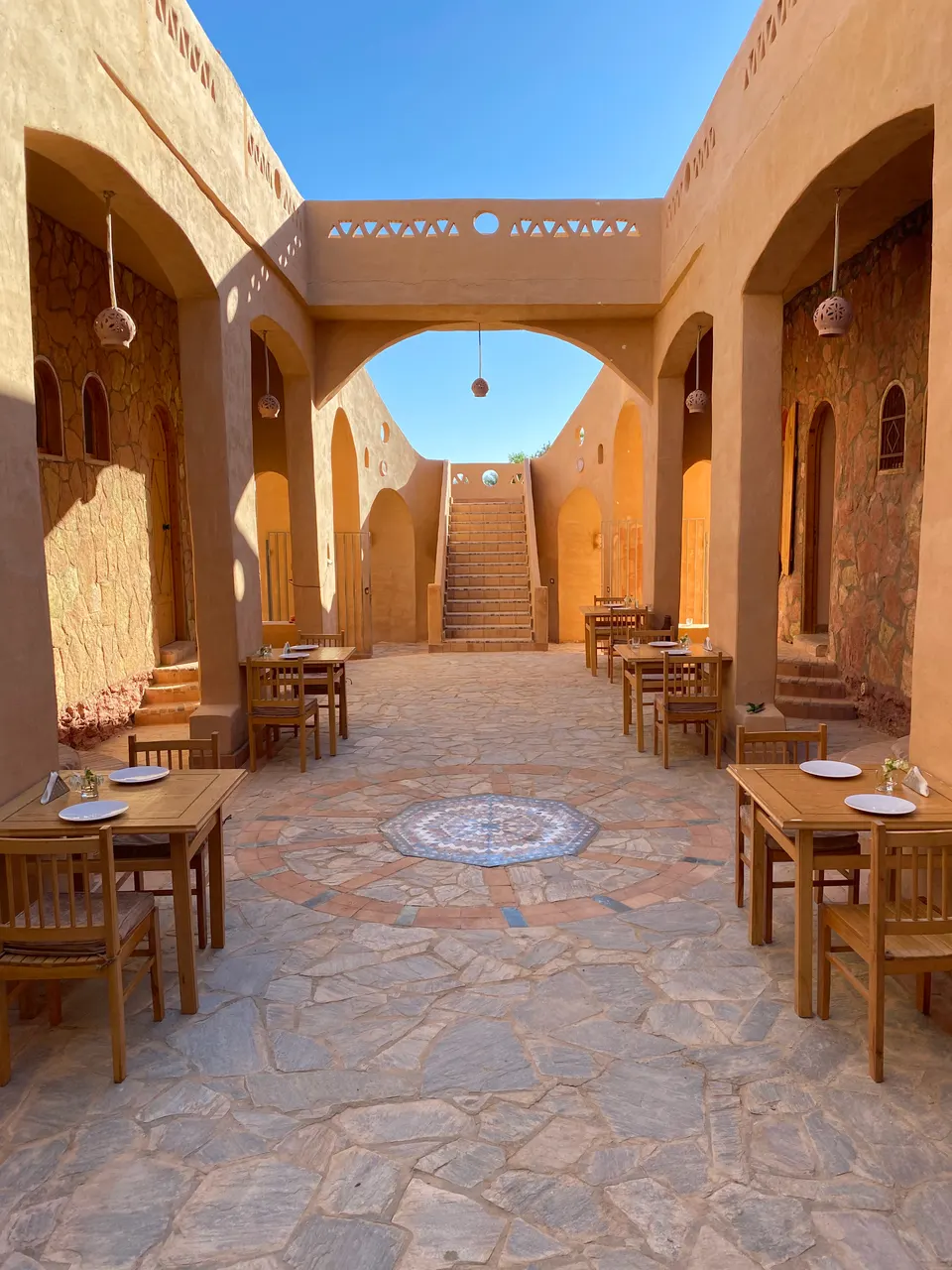 Light and shade beneath the courtyard arches