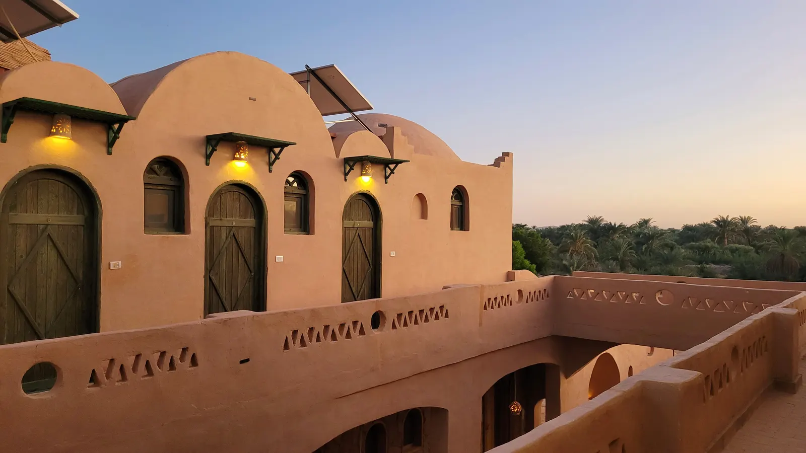 The lodge domes and terrace in the last light of day