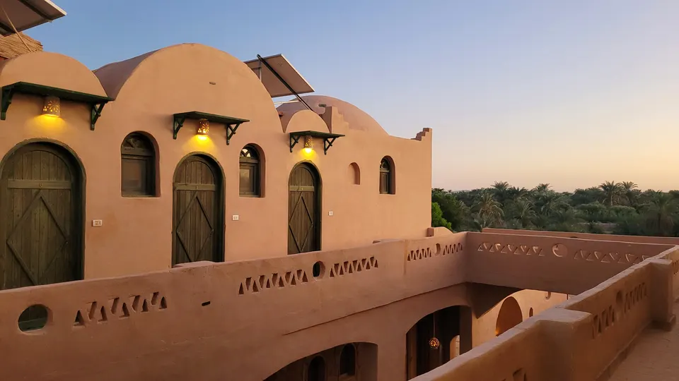 The lodge domes and terrace in the last light of day